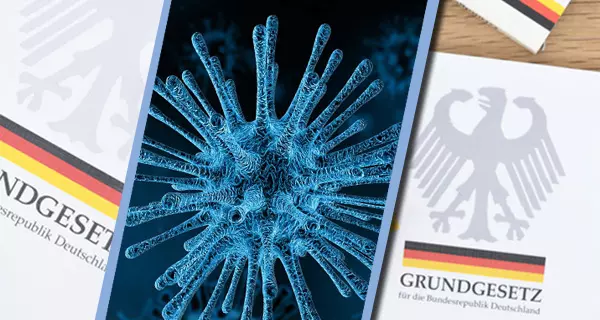 Abbildung Coronavirus vor Ausgaben des Grundgesetzes. Foto: Gerd Altmann, pixabay.com, 4817450 | picture alliance/chromorange, Christian Ohde