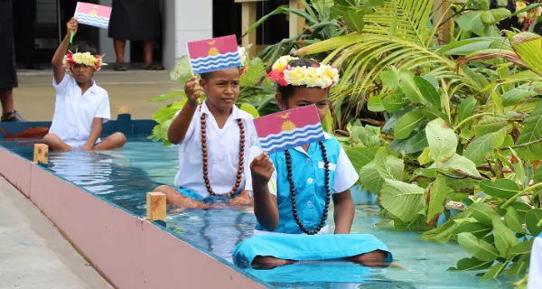 Protestaktion von Kindern auf Tuvalu, einem Inselstaat im SÃ¼dpazifik, um auf den steigenden Meereswasserspiegel aufmerksam zu machen. Foto: Pacific Islands Forum Secretariat